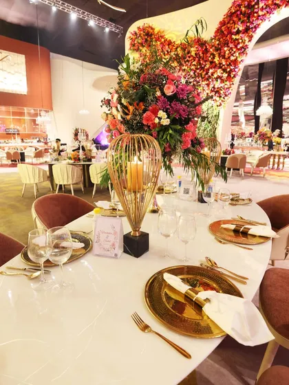 A canvas of gold, florals, and finesse. For us, dining is an art form, and every table setting is a masterpiece of elegance designed to make your guests feel truly honored.