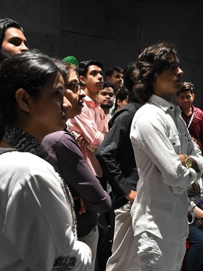 Visitors at our home theatre demo, completely captivated by the immersive experience. Seeing these reactions is why we do what we do.
