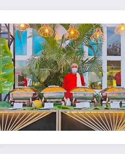 Our South Indian cuisine counter, decorated with banana leaves and offering traditional dishes like idli and sambar.