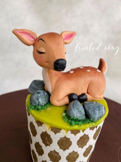The delicate details, like the spots on the fawn, are what bring these sugar figures to life.