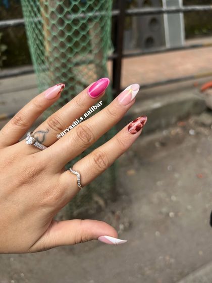 A fun and eclectic set combining a pop of magenta, a touch of tortoiseshell, and a modern white swirl. This shows how you can mix and match different styles for a unique look.