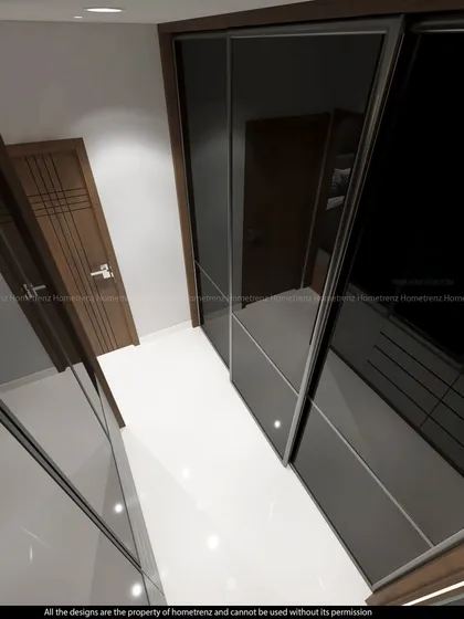 Another angle of the walk-in closet, showing the efficient use of a narrow space to create a functional dressing area.