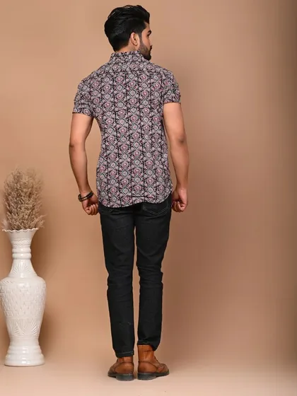 The back view of the men's printed cotton shirt, showing the clean tailoring and comfortable fit.