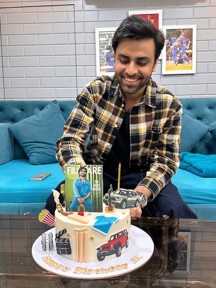 Another happy shot of Jitendra Kumar with his custom birthday cake.