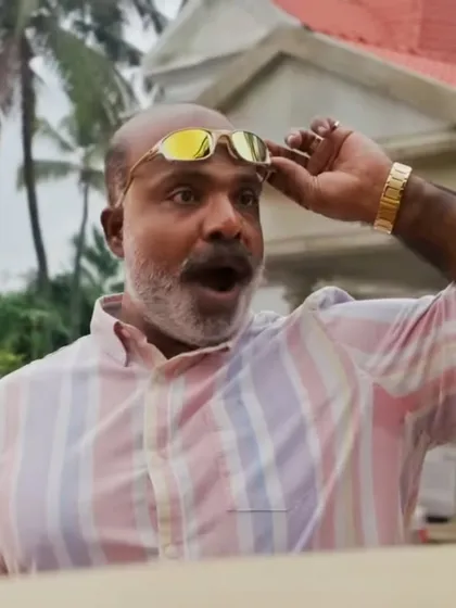 A humorous, expressive shot of Suraj Venjaramoodu from the Asian Paints commercial.