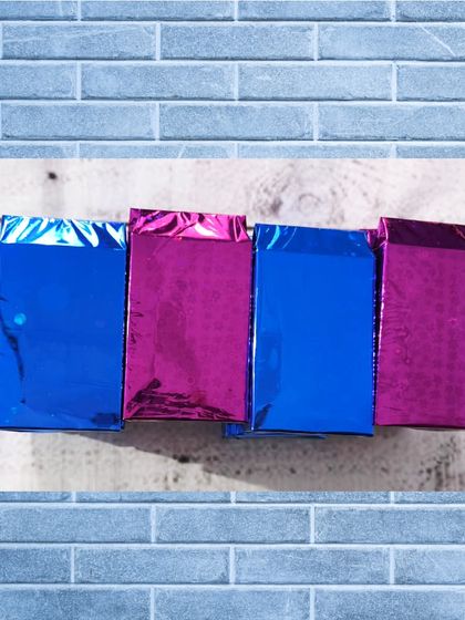 The wallets are packaged in shiny, colorful foil bags, making them an exciting little present to open.