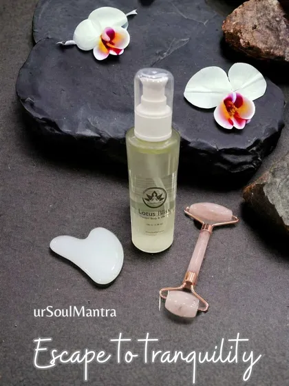 Escape to tranquility with my mindful skincare tools. Here you can see the Lotus Bliss oil paired with the white gua sha and rose quartz facial roller, a perfect combination to soothe skin, reduce puffiness, and promote a natural glow.