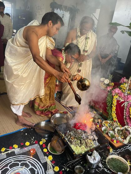 My parents performing the rituals of the yajna. The one who has not understood the love of their parents will never understand universal love. It is important to honor our creators and seek their blessings.