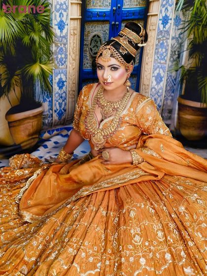 The full seated portrait, showcasing a complete look that is ready for a professional bridal portfolio.