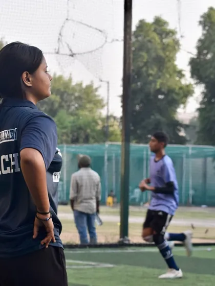 One of my female coaches observing players during a trial. I am proud to have a diverse and expert coaching team that provides guidance and mentorship to all aspiring footballers.