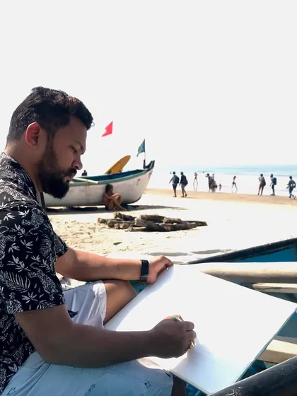 Sketching the scene at a beach in Goa during a workshop. The first step is always to get the composition right.