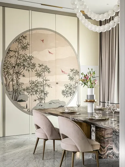 A closer look at the custom dining table and veneer marquetry shutters. The intricate, nature-inspired artwork on the shutters becomes the focal point of the room, showcasing our dedication to bespoke craftsmanship.