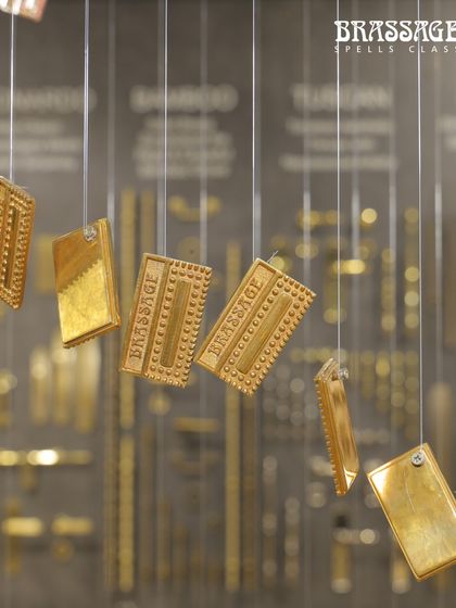 A creative installation at my IndiaWood stall, featuring floating brass finish samples. This artistic display was designed to catch the eye and draw attention to the quality and substance of the solid brass I use in all my products.