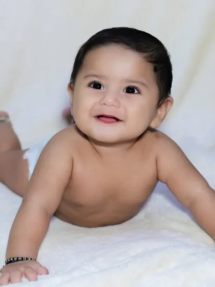 Beyond the themes and props, I also specialize in timeless, classic baby portraits. A simple, clean setup with a soft white background allows your baby's natural expressions and adorable features to be the complete focus of the photograph.