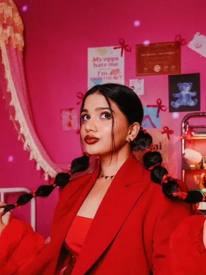 For a creative YouTube series, I designed this playful makeup look with bold red lips and unique bubble pigtails. This shows my ability to adapt to different themes and create character-driven looks for digital content creators.