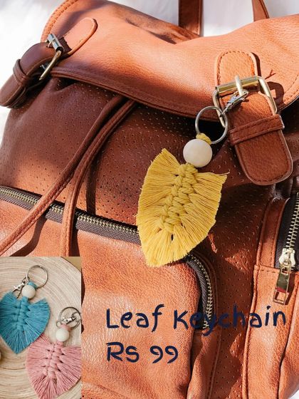 My leaf keychain is a simple and beautiful design inspired by nature. Here it is in yellow, attached to a backpack, but I also make it in other colors like teal and pink.