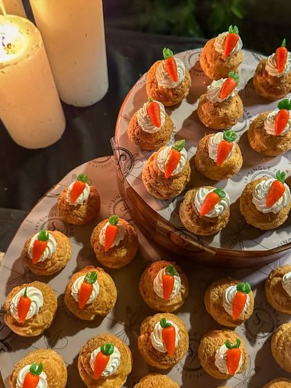 My take on Gajar Halwa, served inside a delicate choux pastry bun and topped with cream and a tiny marzipan carrot. A perfect fusion of Indian and French pastry techniques.