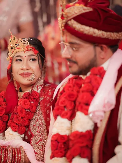 A beautiful portrait of the couple during their pheras. The bride's expression shows her looking towards her future, with her groom by her side.