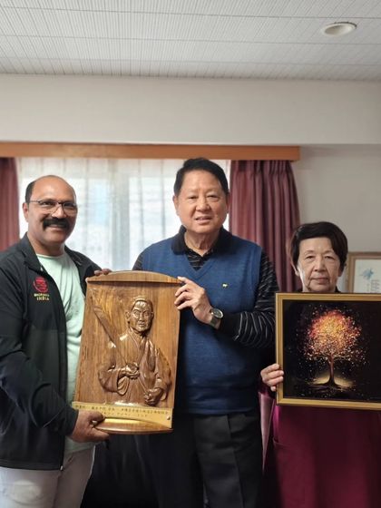 Sharing gifts with Hanshi Minoru Nakazato and his wife, Hiroko Nakazato. Our relationship is built on mutual respect and a shared love for karate.