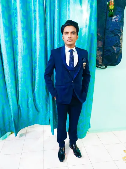 The full reception look. This groom looks sharp and confident, ready to celebrate his wedding.
