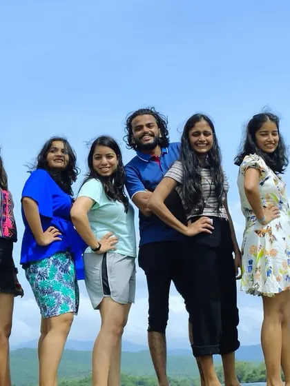 A fun group pose by the water in Chikmagalur.
