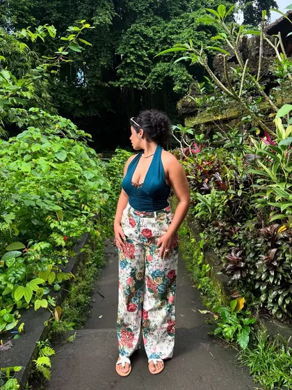 A full-length shot of my jungle explorer outfit. The wide-leg pants are super comfortable for walking around, and the halter top keeps it cool.
