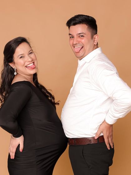 A fun and silly moment between the parents-to-be. I always encourage couples to be themselves, which results in genuine and joyful photographs.