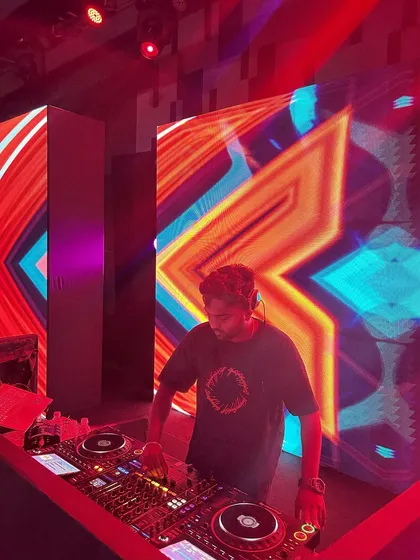 My setup for a high-energy club night, complete with a massive LED wall for stunning visuals. I love working with big productions to create an unforgettable concert feel.