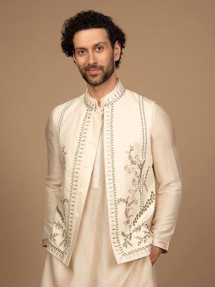 A more personal, close-up view of the embroidered Jawahar jacket. The craftsmanship is evident in the fine threadwork, creating a piece that is both beautiful and timeless.