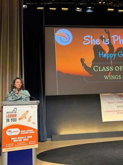 A wider view of my opening speech at the 'She is Phenomenal' graduation event in New York. Standing at this podium was a powerful moment and a reminder to always dream big.
