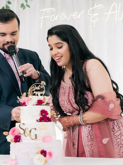 The cake cutting ceremony is always a sweet moment. We capture the couple's happy expressions as they celebrate with a beautiful, personalized cake.
