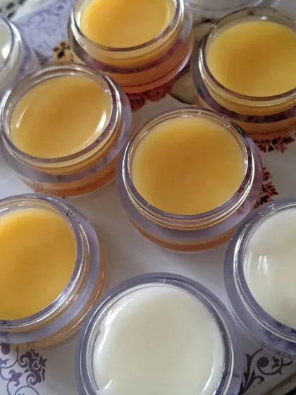 A fresh batch of my handmade lip balms. The yellow is mango flavored and the white is another soothing variety, both made to keep your lips hydrated.