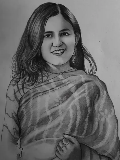 An A4 size graphite pencil portrait done as a commission. The goal was to create a beautiful gift by focusing on the subject's pleasant expression and the details of her saree.