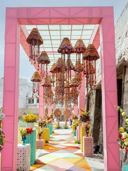 A wedding should be a reflection of your personality, and that includes having fun. This vibrant Haldi carnival entrance, with its colorful hanging decor and playful vibe, was designed to kick off the festivities with energy and joy. I love planning events that are as fun as they are beautiful.