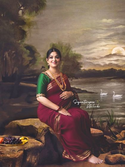 A serene, painterly portrait of a mother-to-be seated by a lake, creating a timeless and artistic image.