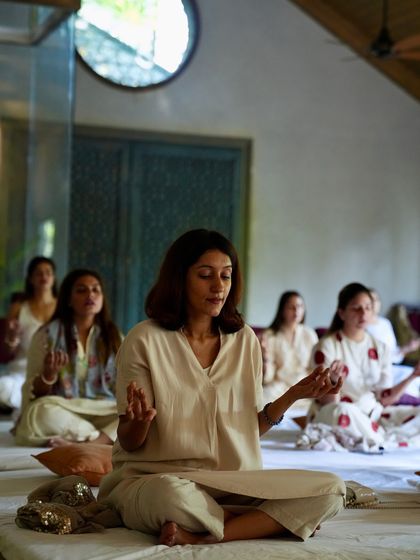 Students deep in meditation, each on their own journey but held by the collective energy of the Sangat.