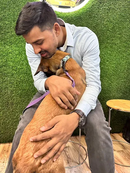 A quiet, affectionate moment with Cacy. This is the trust and love that fuels our training partnership.