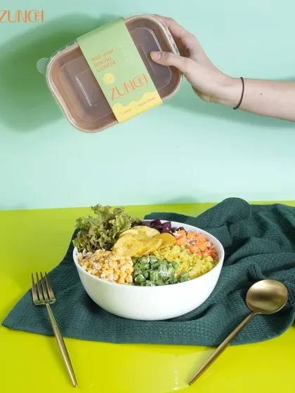 Introducing our Sundal-icious bowl. This unique creation features a base of poha and mixed dal sundal, topped with crunchy veggies and tender coconut for a South Indian twist.