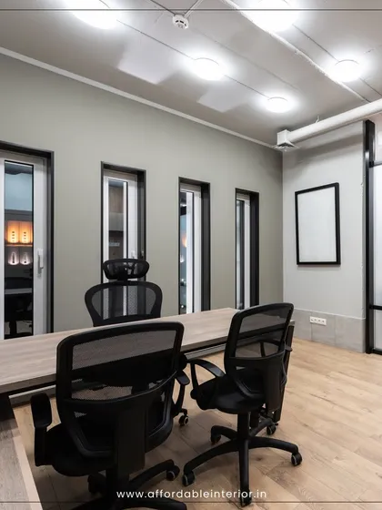 A minimalist executive office designed for focus and clarity. The simple color palette, clean lines of the furniture, and uncluttered layout create a calm and productive environment for leaders.