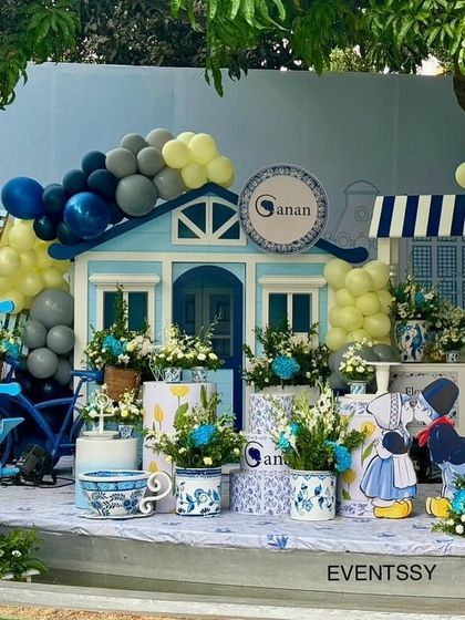 A charming and unique Delft Blue themed party, inspired by Dutch windmills, tulips, and classic blue and white pottery.