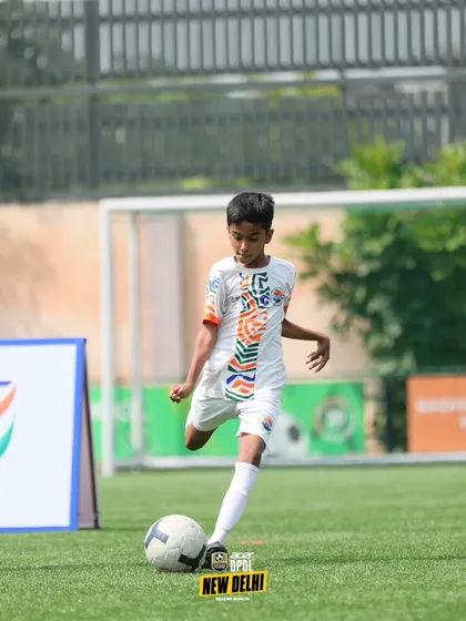 A young player practices his shooting technique. We break down every aspect of the game to ensure our players master the fundamentals.