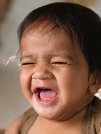 A big, hearty laugh that you can almost hear. Capturing the sound of your baby's laughter in a single photo is one of my favorite parts of the job.