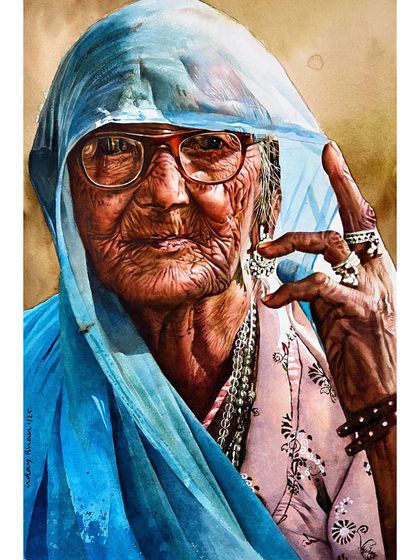 In this advanced portrait, I focused on the translucent quality of the blue veil and the way it frames her face. Capturing the intricate details of the jewelry and the texture of aged skin is a meditative process.