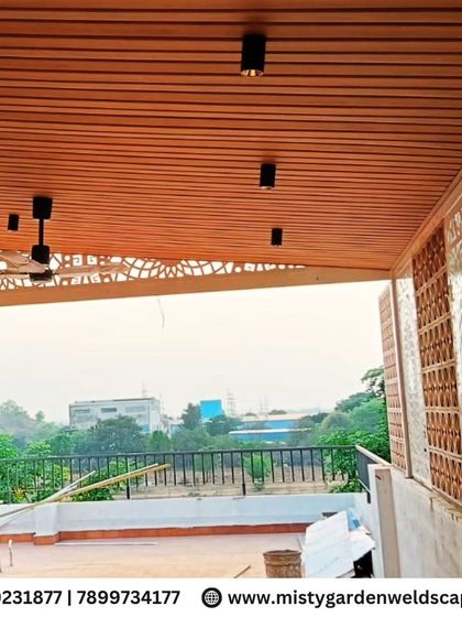 The interior of the Hoskote project, showing the interplay of light through the CNC and jali brick panels. The PVC ceiling with modern lighting fixtures completes this elegant and well-ventilated space.