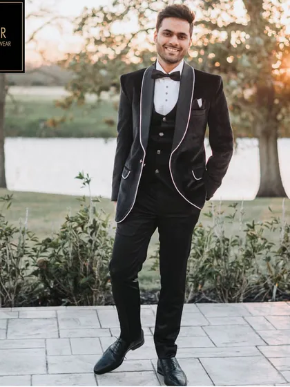 A happy client is the best reward. Here is a customer looking sharp in a custom black velvet tuxedo I designed for his big event. The fit and confidence say it all.