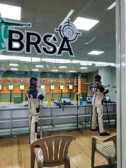 Another perspective of the range, highlighting the professional setup with electronic targets and ample space for each shooter.
