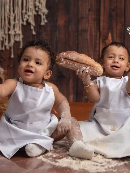 These two little bakers are turning two. A cake smash or a themed birthday shoot is a fantastic way to celebrate your child's milestones with a bit of happy, playful mess.