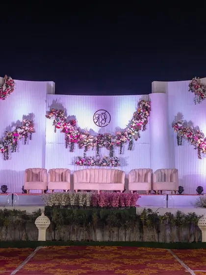 A wider view of the magnificent reception stage, showing the full scale of the design. I ensure that the stage is a beautiful focal point, no matter the size of the venue.
