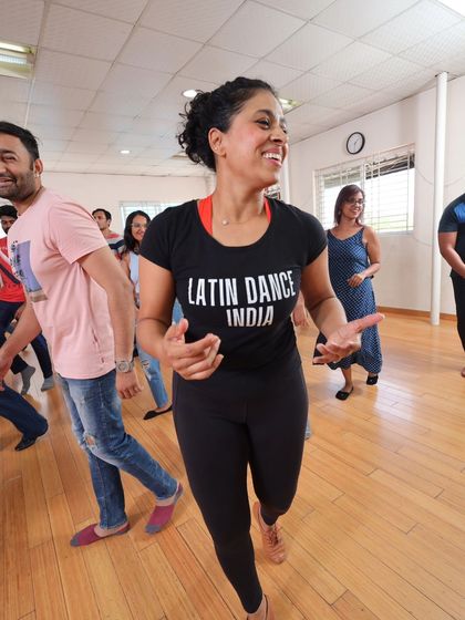 The joy of movement is contagious. I love leading my students and sharing the energy and rhythm of Latin music with them.