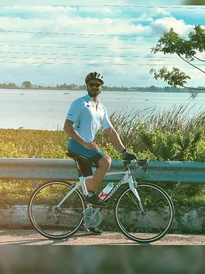 I don't just coach from the sidelines; I ride with you. Here I am on a scenic road cycling route in Bengaluru, because I believe in practicing what I preach and sharing the road with my athletes.